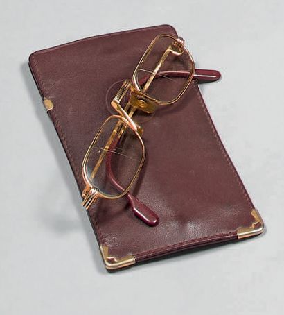 CARTIER.
Brown leather glasses case, with...