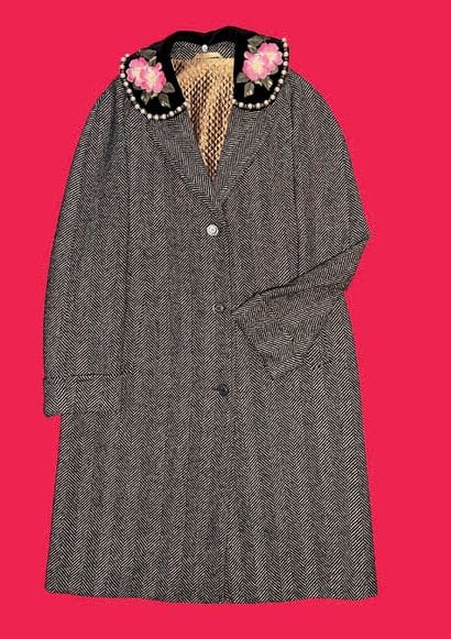 GUCCI.
Manteau en laine à bandes de chevrons....