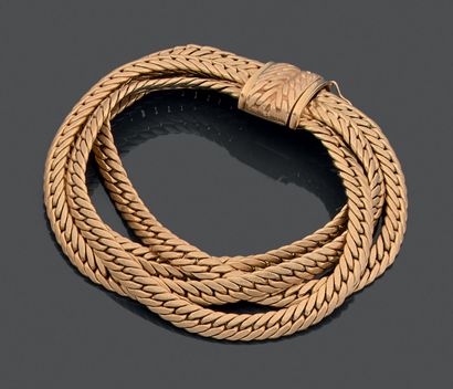 Bracelet in yellow 18K (750), with English...