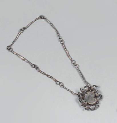 Silver necklace (800), the chain formed of...