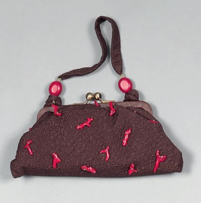 F.O.U. London.
Small bag in brown embossed...