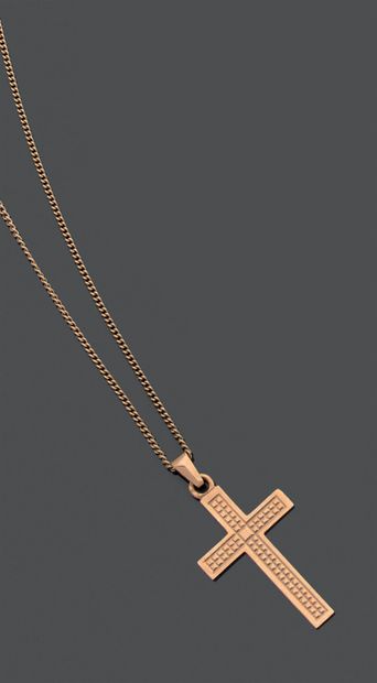 Fine chain and cross pendant in 18K (750)...