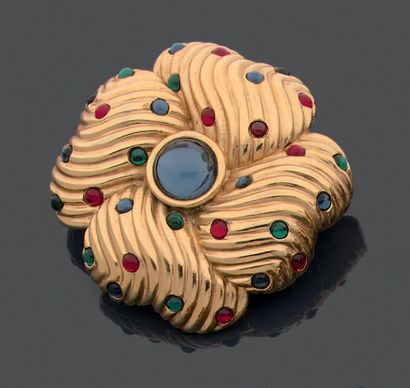 Gilded metal brooch featuring a flower, decorated...