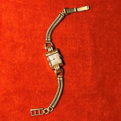 Montre de dame en or jaune 18K (750), les...