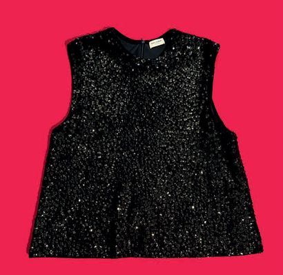 Yves SAINT-LAURENT Paris.
Blouse sans manche...