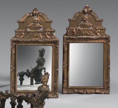 Pair of small mirrors in gilded wood with...