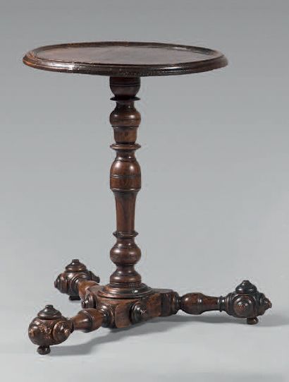 Pedestal table in natural wood. The round...