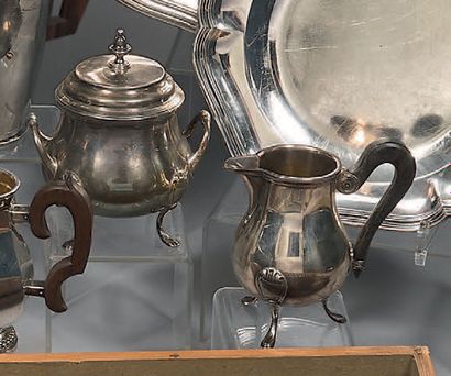 Covered sugar bowl and milk jug in plain...