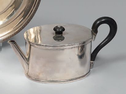Small teapot of oval form in plain silver...