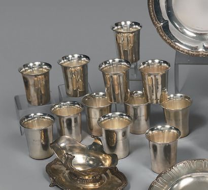 Twelve large truncated cone-shaped kettledrums...