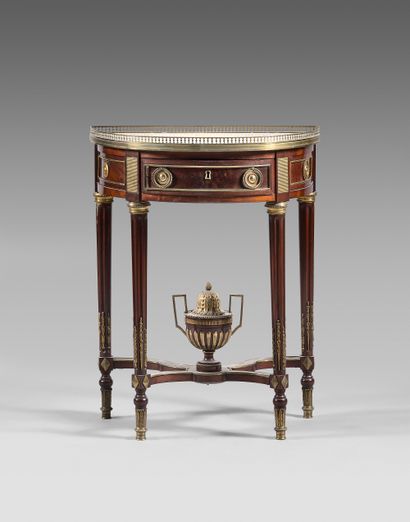 Mahogany and mahogany veneer half-moon console....