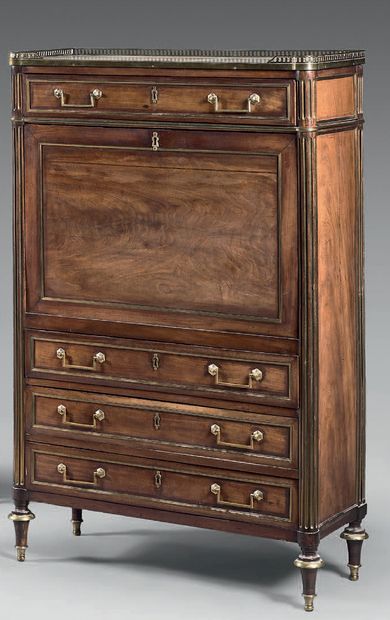 Mahogany and mahogany veneer secretary. Ornamented...