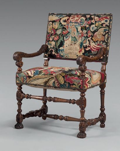 Armchair in natural wood molded and carved...
