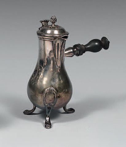 Small tripod silver jug, the spout with flutes,...