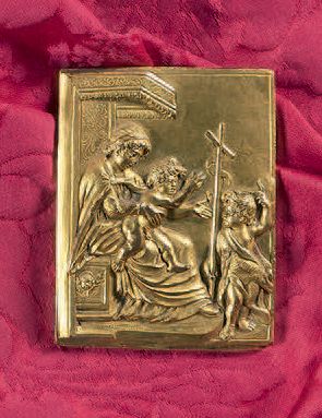 Gilt bronze plaque with chiseled decoration...
