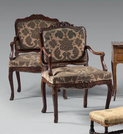 Pair of armchairs in natural wood molded...
