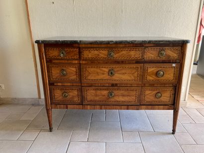 Chest of drawers with a slight central projection...