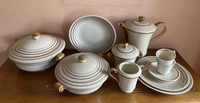 LIMOGES. Part of table service in porcelain,...