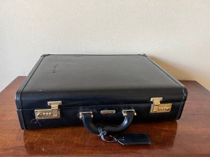 LANCEL. Attaché case in black box. The closures...