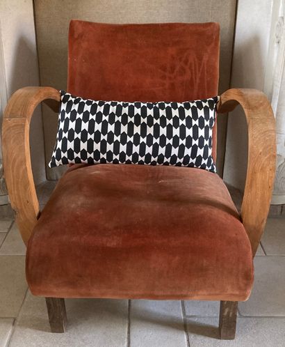 Two armchairs in natural wood, one of them...