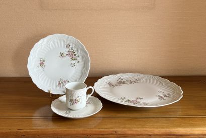 LIMOGES. Part of table service in white porcelain...