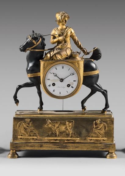 Clock in patinated and gilded bronze with...