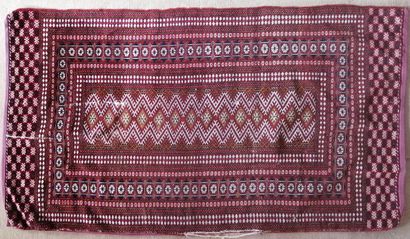 Oriental wool carpet decorated with three...