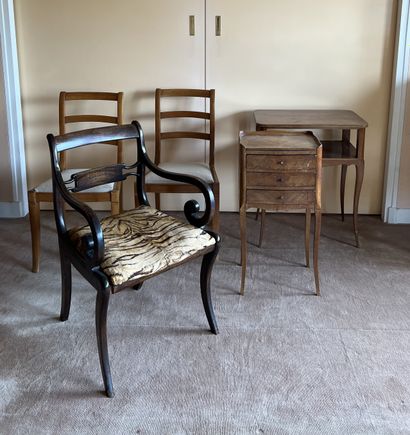 Varnished wood table with curved legs joined...