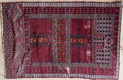 Oriental wool carpet with reserves of stylized...