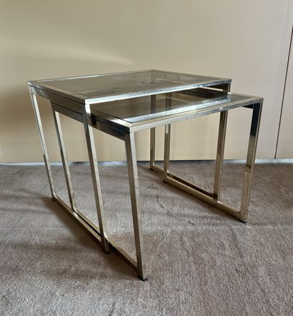 Suite of two nesting tables in chromed metal,...