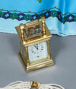 
Gilt bronze travel clock, the gilt bronze...