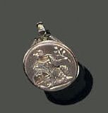 Seal in steel, the oval matrix representing...