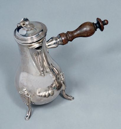 Silver pot, baluster shape, standing on three...