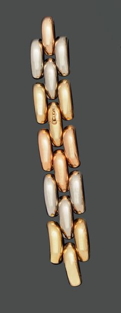 Articulated bracelet in three colors of gold...