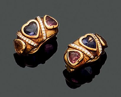 Pair of curved ear clips in 18K (750) yellow...