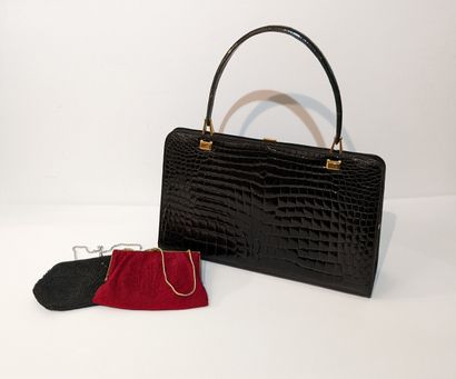 Black leather bag crocodile style, scratched...