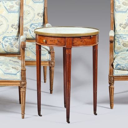 Mahogany and mahogany veneer bouillotte table....