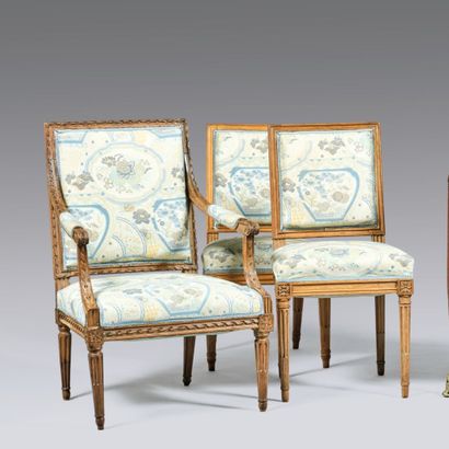 Armchair in natural wood carved with ribbon...