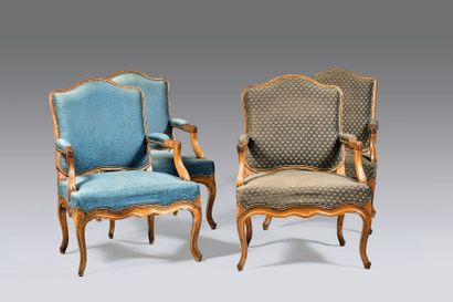 Suite of four armchairs in molded natural...