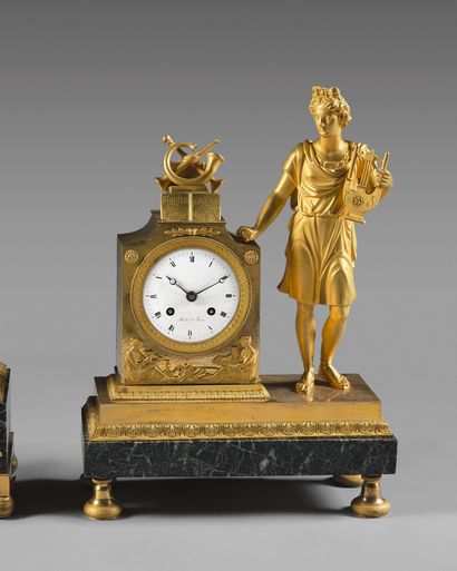Clock in gilded bronze representing Apollo...