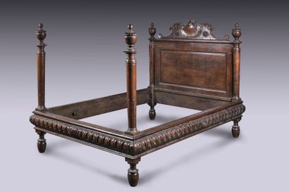 Bed in fruit wood, the pediment of the bedside...