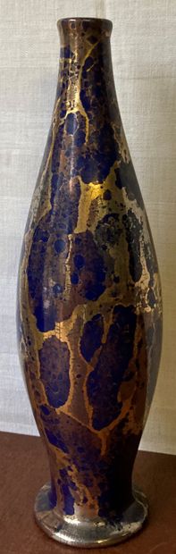 Spindle-shaped ceramic vase with marbled...