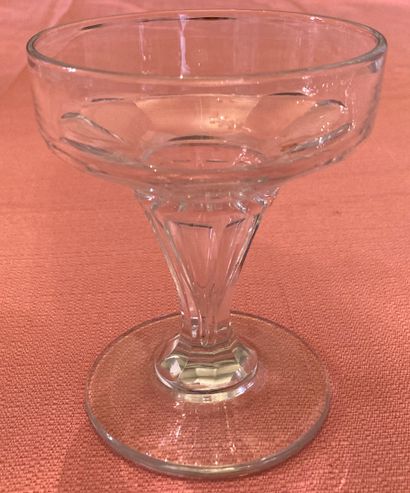 Twelve champagne glasses in faceted crys...