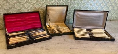 In cases: suite of six brass fruit cutlery,...