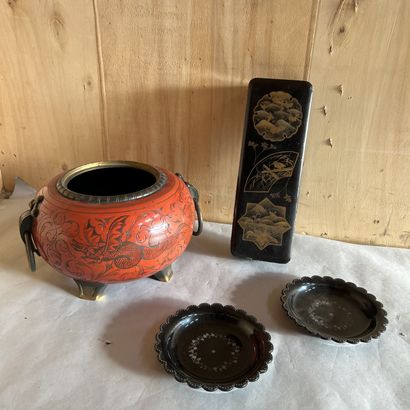A coral lacquered wood pot holder with engraved...