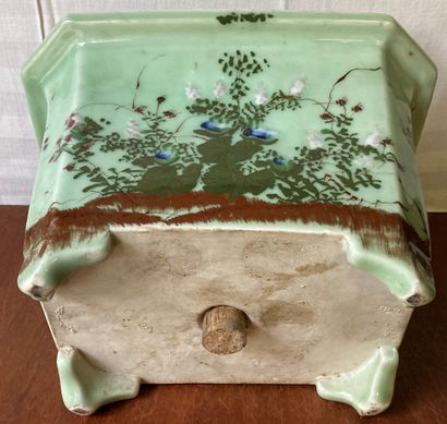 Porcelain planter with cut sides decorated...