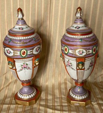 Pair of covered vases of baluster form in...