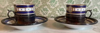 Pair of white porcelain cups, the border...