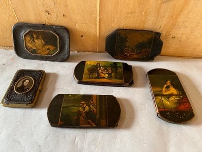 Four cases, the plates in papier-maché decorated...