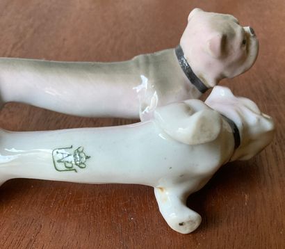 Eight porcelain knife holders, six featuring...
